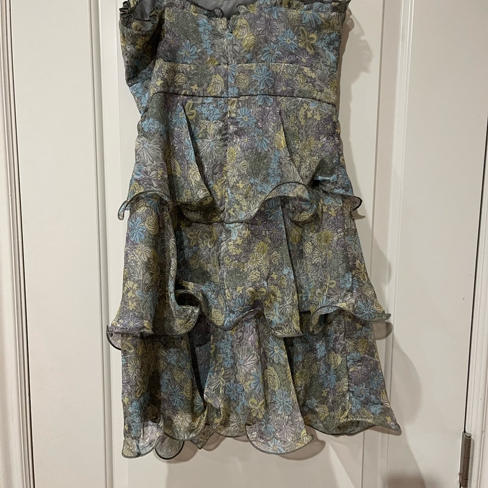 Brand new sundress. See second pic for length. Size S